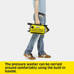 Load image into Gallery viewer, A person in jeans and a light blue shirt carries a yellow and black Kärcher pressure washer by its built-in handle, shown against a light gray background with a yellow text banner at the bottom.