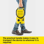 Load image into Gallery viewer, A person wearing blue jeans and brown shoes holds a bright yellow Kärcher pressure washer with a black hose. The image has a yellow text banner at the bottom that reads, 'The practical handle makes it easy to transport the device to wherever it is required.
