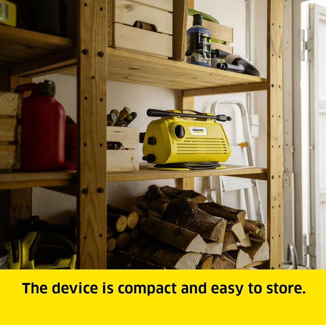 Yellow device on a wooden shelf with tools and firewood in a workshop setting.