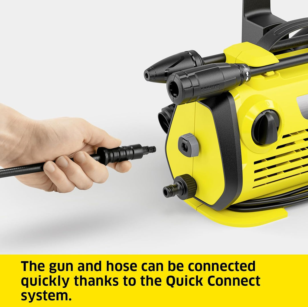 Hand connecting a black gun and hose to a yellow pressure washer with text about the Quick Connect system.