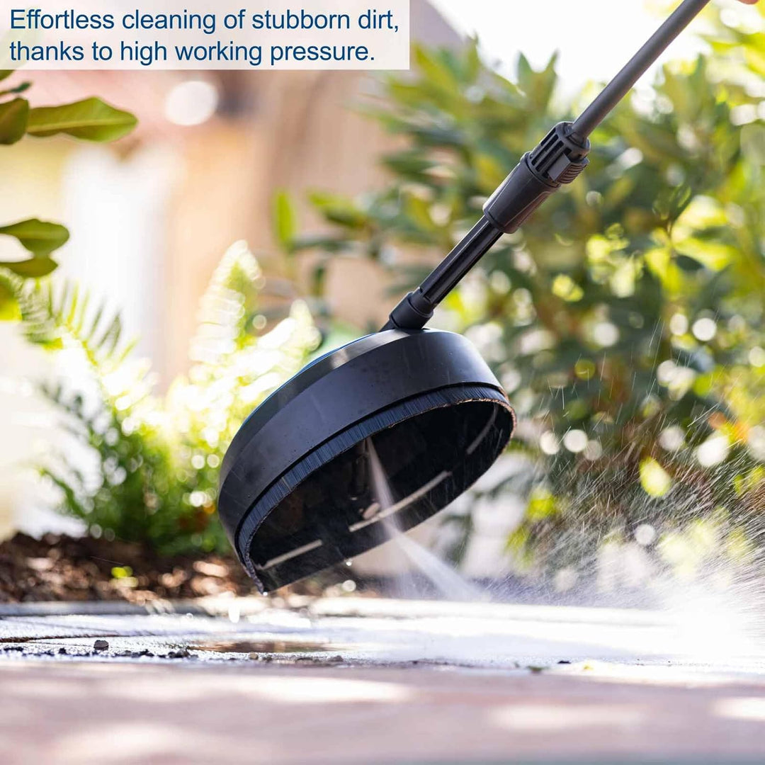 Pressure washer cleaning a surface with greenery in the background